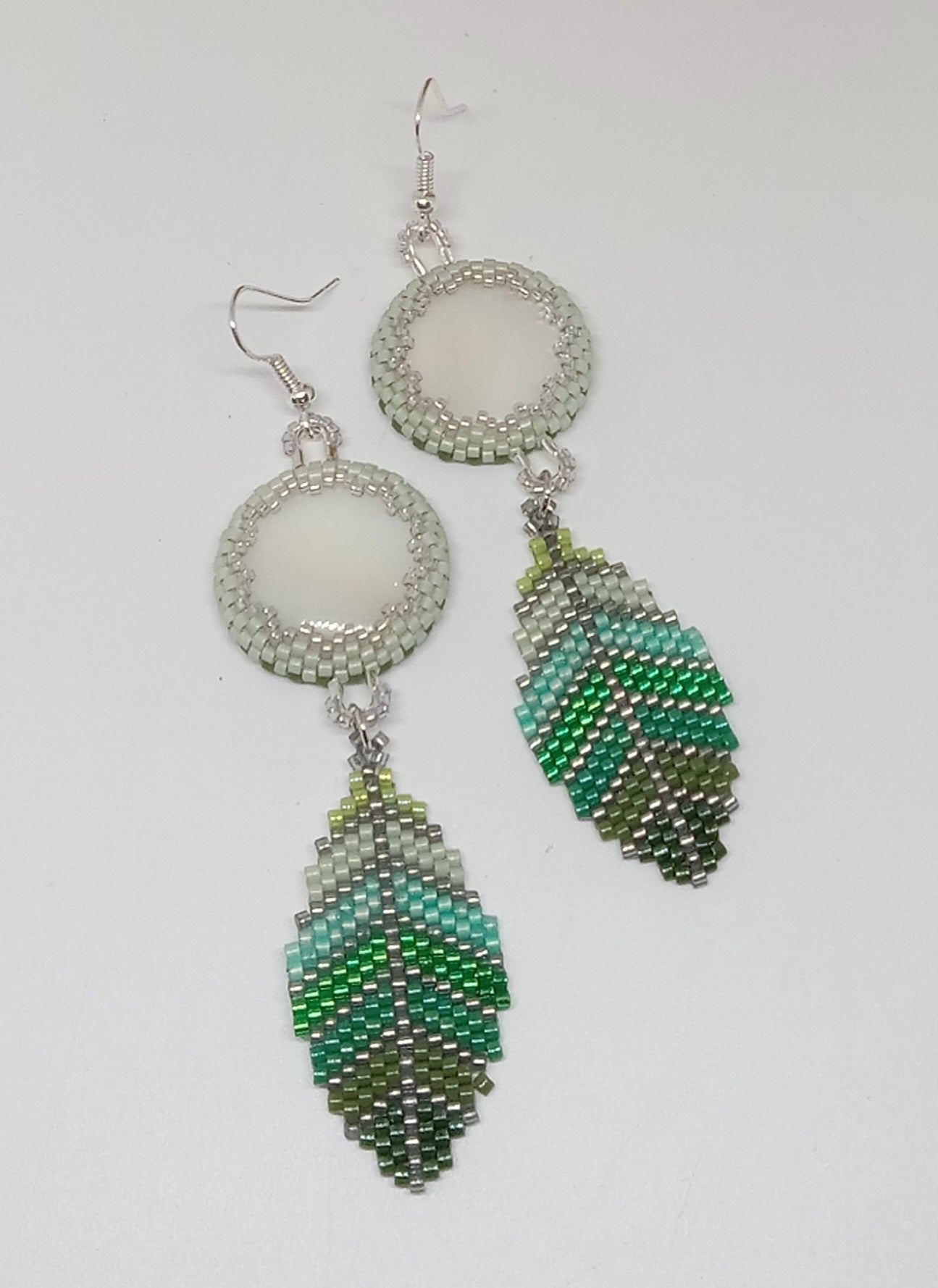 Mother of Pearl and leaves of green earrings